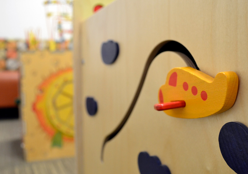 Photo: Toy airplane on a block in the IHDD playroom. 