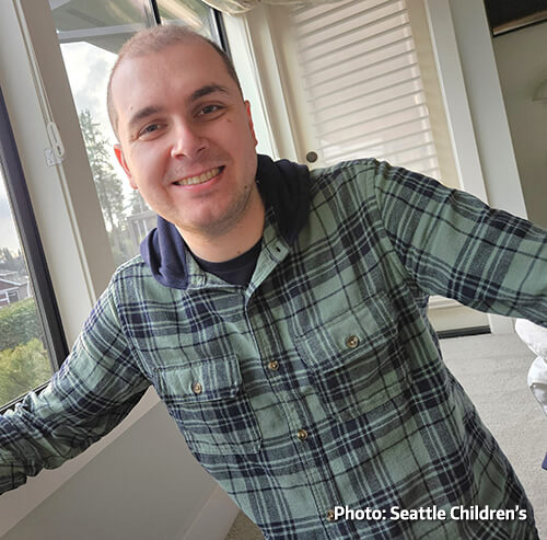 Photo: Trevor Pacelli, author and writer of an article on the Seattle Children's Autism Blog, 'Speaking Up as an Autism Mentor.' Trevor is smiling in the photo.