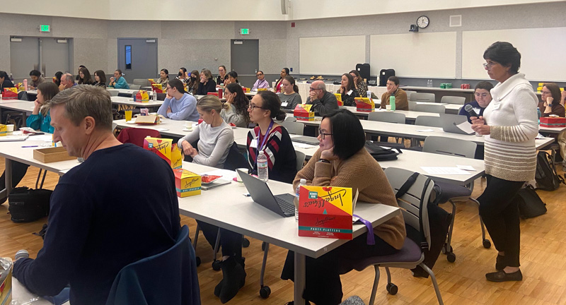 Photo: Attendees asking questions of the panelist at the 2024 IHDD Lunch and Learn event.