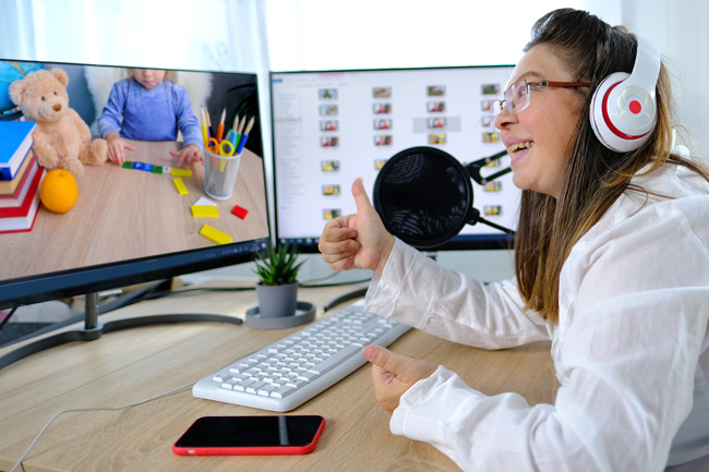 Clinician and young patient in a developmental screening session.