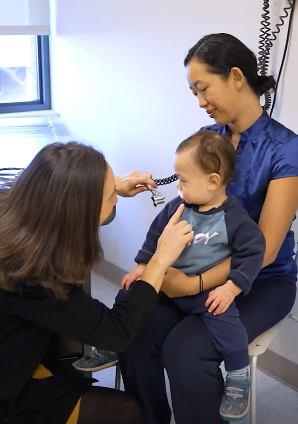 Young patient and parent in an IHDD Specialty Clinic