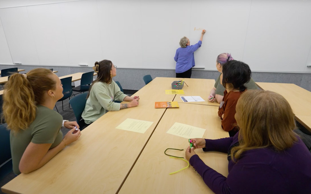 UW LEND trainees in a training session.