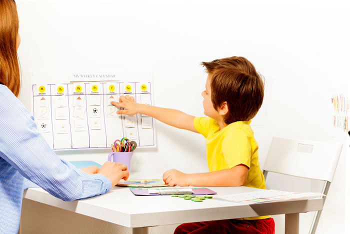 Child and clinician scheduling on a calendar.