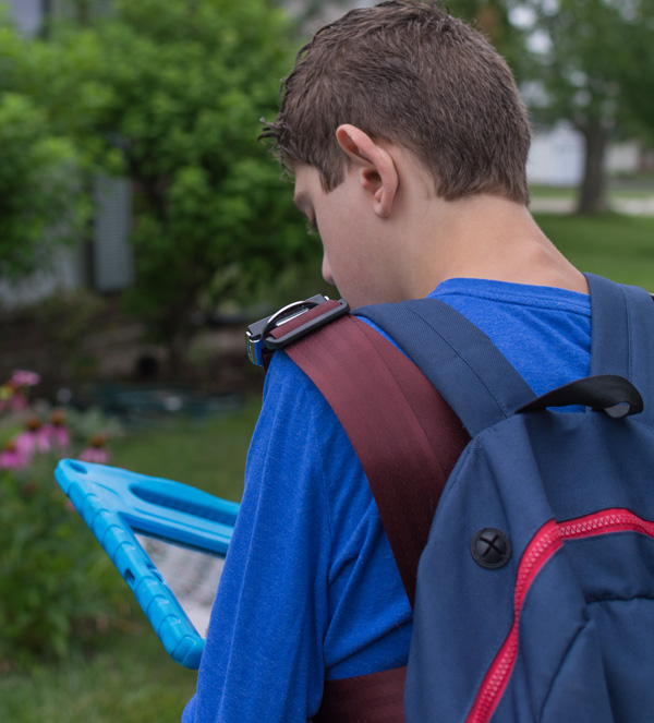 Student using an AAC device.